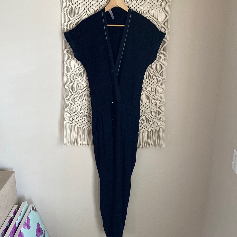 D. Exterior, Made In Italy. Black jumpsuit, with silver beaded trim, siz…